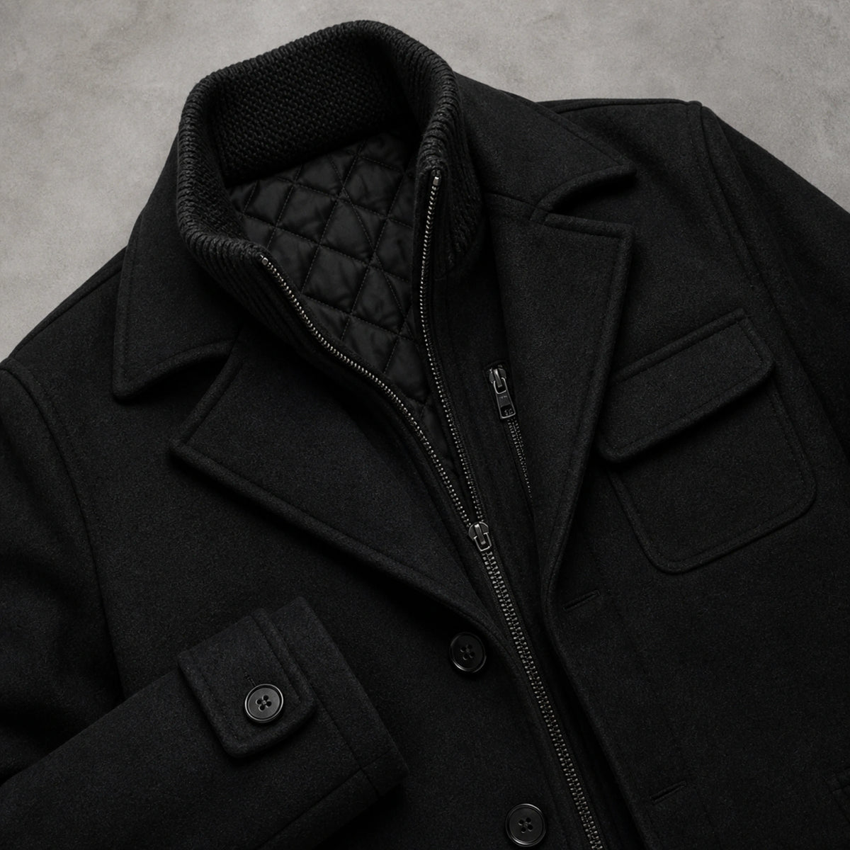 winter coat — Black wool coat funnel collar quilted lining lapel zipper and cuff detail — view 6