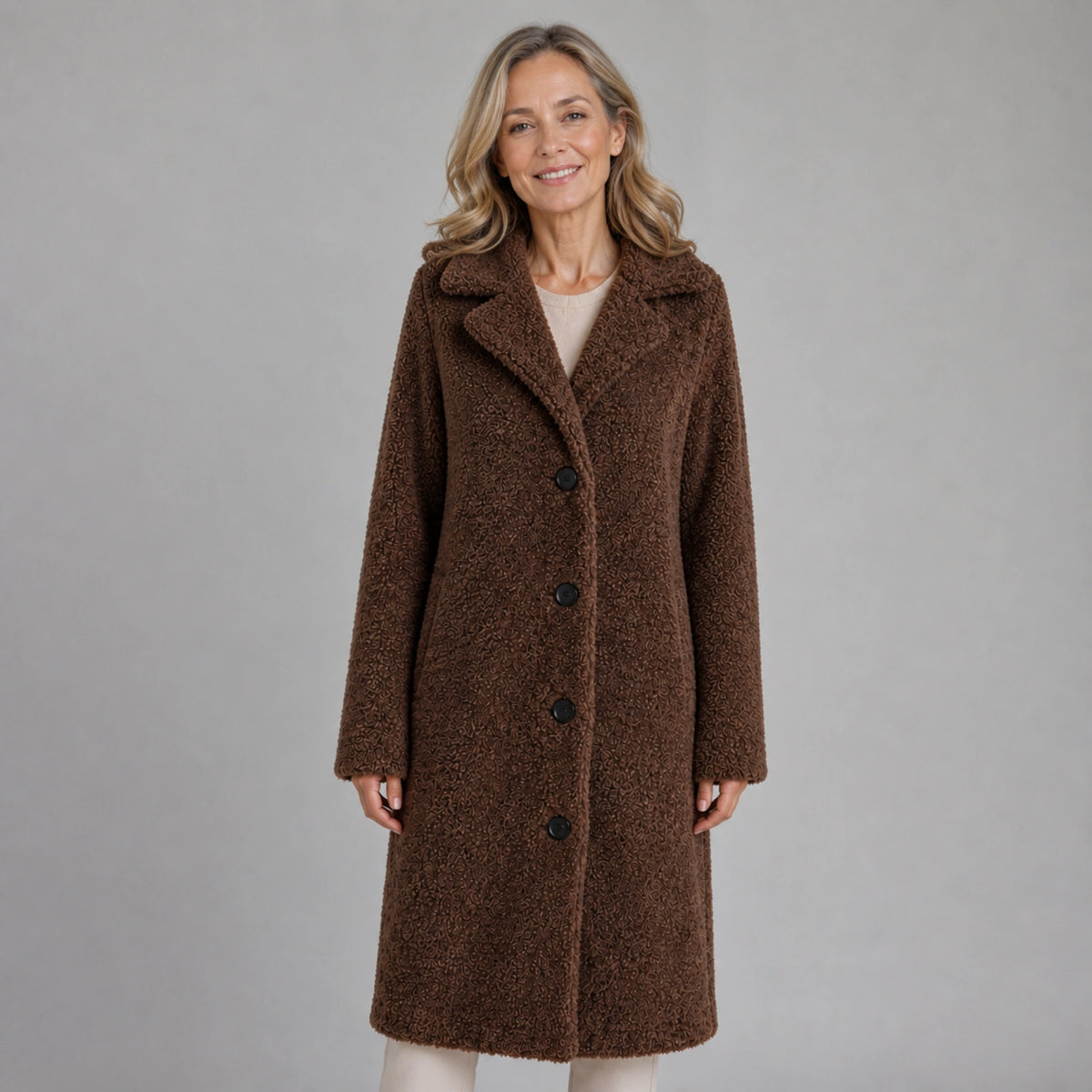 winter coat — Mature woman wearing chocolate brown long teddy fleece button coat front view — view 3