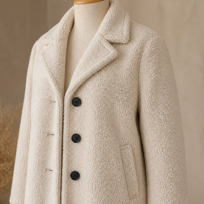 winter coat — Ivory teddy coat lapel buttons pockets seams and dense fleece detail — view 6