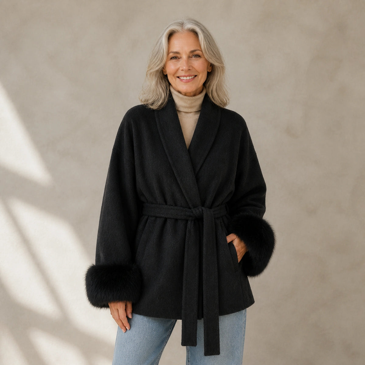 winter coat — Mature woman wearing midnight navy wool blend wrap coat with matching plush cuffs front view — view 4