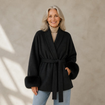 winter coat — Mature woman wearing midnight navy wool blend wrap coat with matching plush cuffs front view — view 4