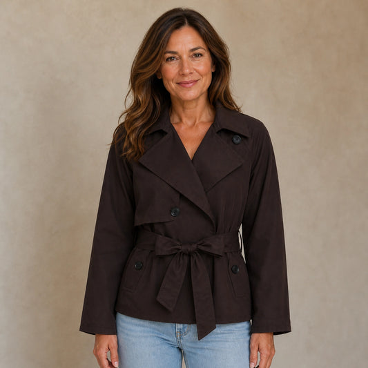 winter coat — Mature woman wearing dark chocolate cropped double breasted belted trench jacket front view